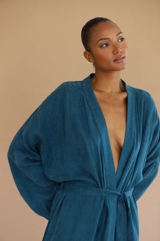 Woman wearing Be Idle Long Robe in Teal