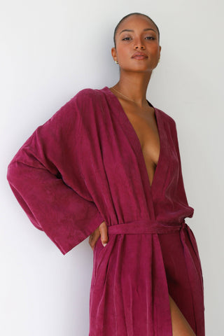 Soft, purple long robe for women with matching tie belt for relaxed lounging