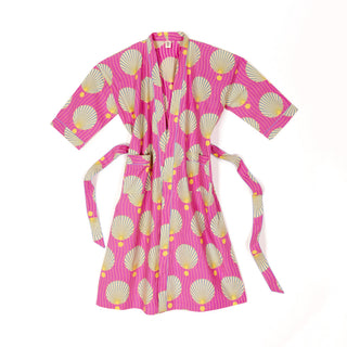 Pink robe with shell pattern on a white background