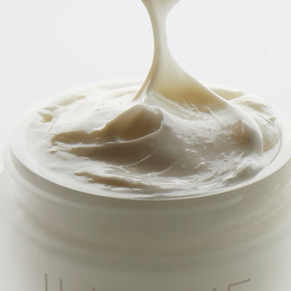 Close-up of a jar of cream with a smooth texture