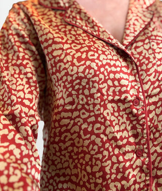Close up of cute red and gold leopard matching pajama set