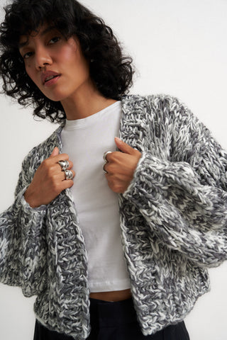 Woman wearing grey knit sweater from Callahan Knitwear