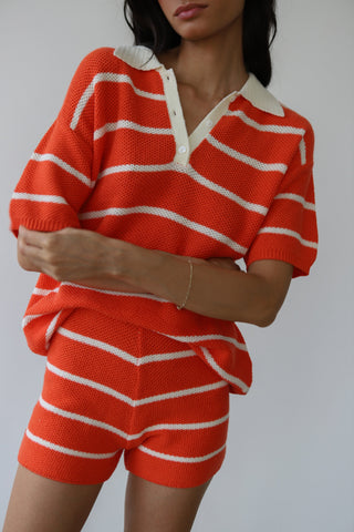 Woman wearing Callahan red and white strip knit shorts