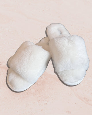 Cozy white sheepskin house slippers for women