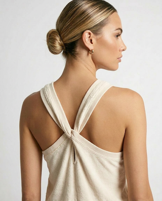 Beige tank top jumpsuit with back twist detail