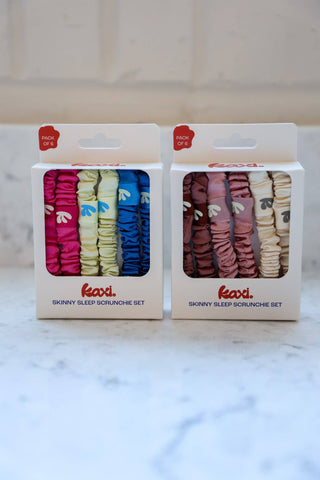 Two packages of Kaxi skinny satin scrunchies
