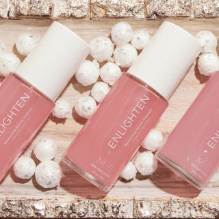 Pink bottles of M.S Skincare Enlighten Glycolic Acid treatment