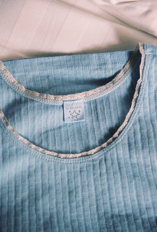 Cotton pointelle tank top in french blue color with lace trim