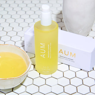A bottle of M.S Skincare AUM Lavender Body Oil