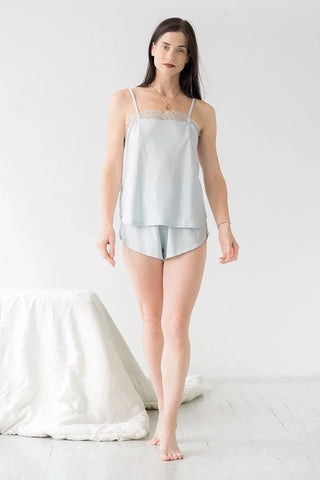 Women wearing Salua Lingerie tank top and shorts soft sleep set in powder blue