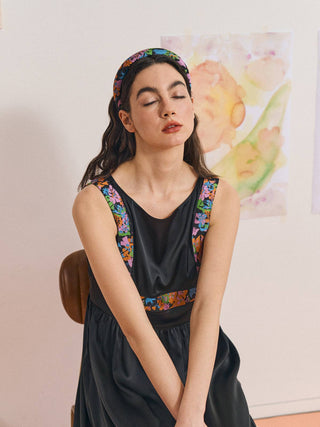 Woman wearing Lost Pattern black and floral headband