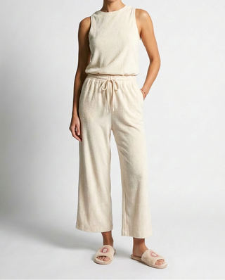 Soft sleeveless beige jumpsuit with crop bottoms