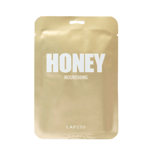 Lapcos honey nourishing face mask in honey colored packaging on a white background. 